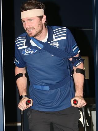 Patrick Dangerfield rocks up to a press conference in fake bandages and sling, in a reference to comments made by Kane Cornes that he fakes his injuries. Picture: Mark Wilson