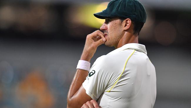 Mitchell Starc contemplates his bowling.