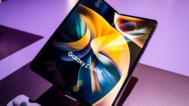 Samsung's fourth generation folding phone, the Galaxy Z Fold4, on show at a New York event, features more powerful cameras and adds a taskbar for apps. Picture: Jennifer Dudley-Nicholson