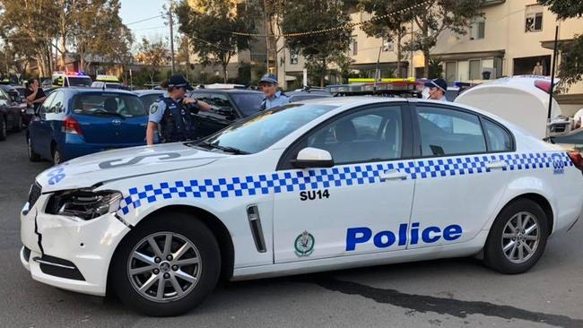 A police car was damaged during the shocking incident.