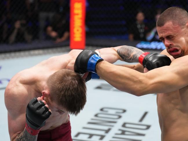 Nolan lands a left hand on Bogdan Grad. Picture: Al Powers/Zuffa LLC)