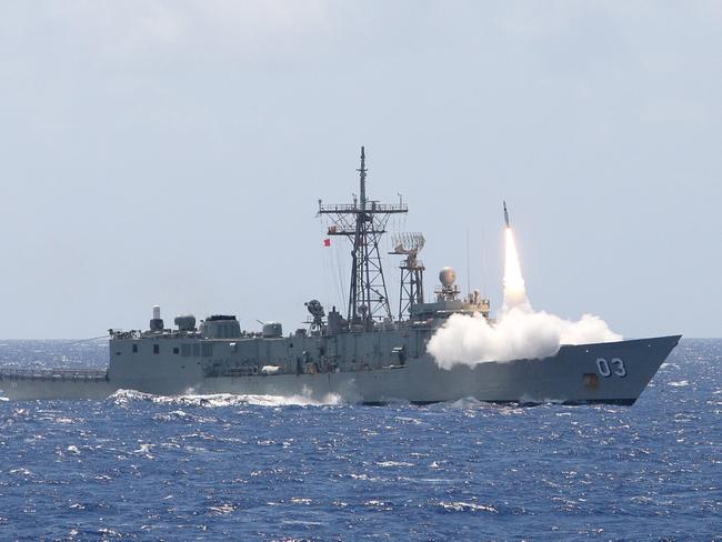 Guided missile frigate ... Missile firing from HMAS Sydney, which is heading to intercept the Russian vessels in the Coral Sea. Picture: RAN