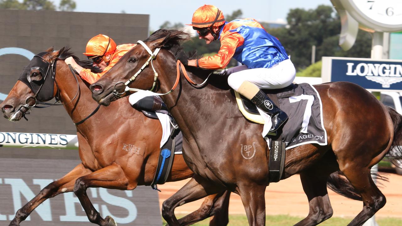 Think It Over (outside) winning trhe Group 1 George Ryder Stakes. Picture: Grant Guy
