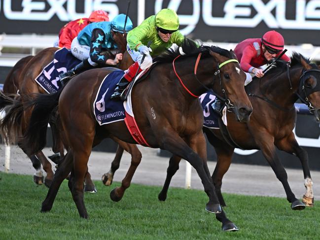 MELBOURNE, AUSTRALIA - SEPTEMBER 10: Craig Williams riding Berkeley Square winning Race 9, the Exford Plate, during Melbourne Racing at Flemington Racecourse on September 10, 2022 in Melbourne, Australia. (Photo by Vince Caligiuri/Getty Images)