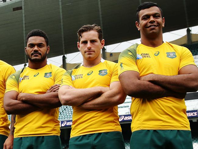 Wallabies players Nick Phipps, James Horwill, Rob Simmons, Will Skelton, James Slipper, Stephen Moore, Israel Folau, Henry Speight, Bernard Foley and Kurtley Beale during the launch of the 2015 Qantas Wallabies World Cup Jersey by ASICS at Allianz Stadium, Sydney. Pic Brett Costello