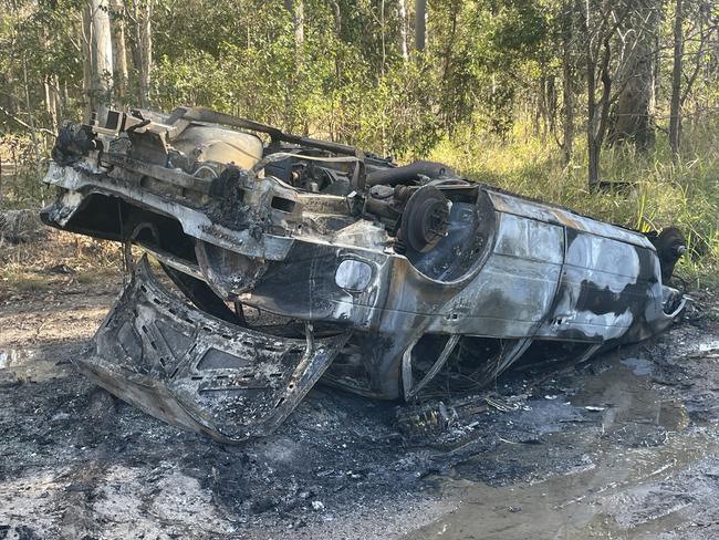 Car rolled and torched in bushland near Coomera. Picture Supplied