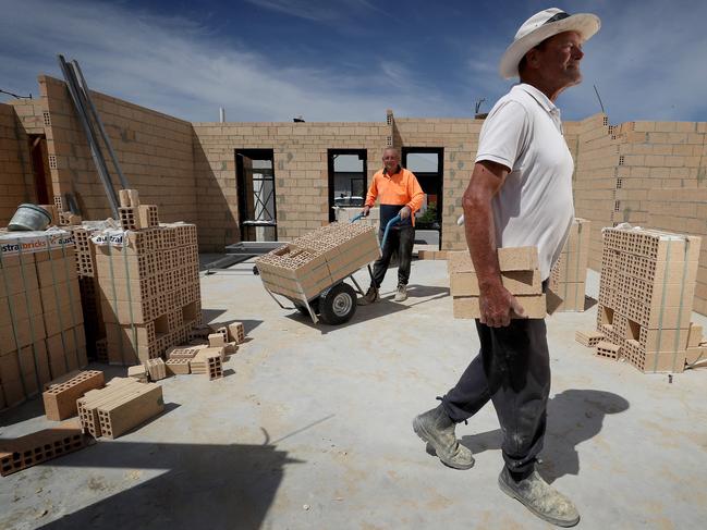 17/10/2019Homegroup tradies John Inwards (closest) and Perry Albon at LendLease's coastal subdivision north of Perth, Alkimos Beach.Pic Colin Murty The Australian