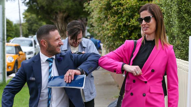 Harcourts auctioneer Daniel Galea practised elbow taps. Picture: Tim Carrafa