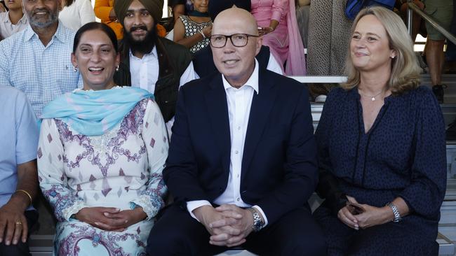 Liberal candidate for Greenway Rattan Virk, Peter Dutton and wife Kirilly at the Australian Sikh Games at Bass Hill in Sydney’s west. Picture: Richard Dobson / NewsWire