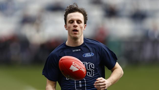 GEELONG, AUSTRALIA - JULY 09: Max Holmes of the Cats warms up before the round 17 AFL match between Geelong Cats and North Melbourne Kangaroos at GMHBA Stadium, on July 09, 2023, in Geelong, Australia. (Photo by Darrian Traynor/Getty Images)