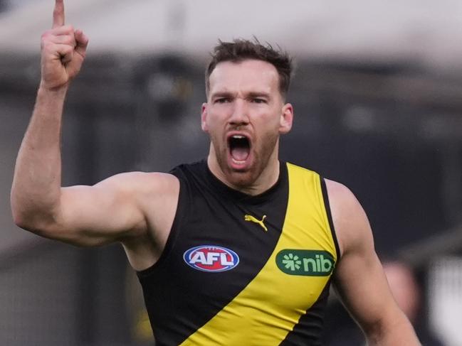 MELBOURNE, AUSTRALIA - JUNE 30: Noah Balta of the Tigers celebrates kicking a goal during the round 16 AFL match between Richmond Tigers and Carlton Blues at Melbourne Cricket Ground, on June 30, 2024, in Melbourne, Australia. (Photo by Daniel Pockett/Getty Images)