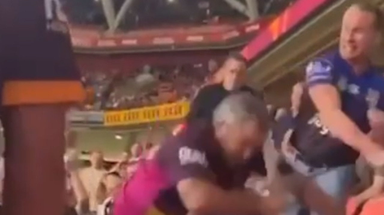 Wade Ruben Hornery is smacked in the face by a Bulldogs supporter after his disrespectful actions during the Anzac Day ceremony prior to the Brisbane Broncos/Canterbury Bankstown Bulldogs clash on April 22.