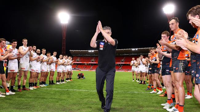 Giants coach Leon Cameron leaves the field through a guard of honour after his last match. Picture: Mark Kolbe/Getty Images