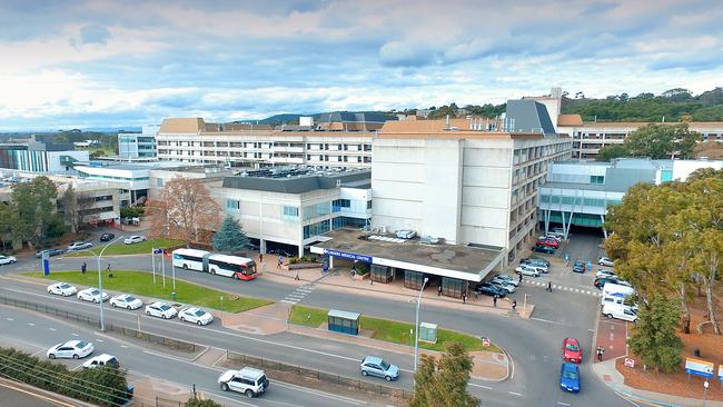 A gastro outbreak at Flinders Medical Centre occurred just weeks after an internal memo told clinical staff to move potentially contagious patients into general wards.