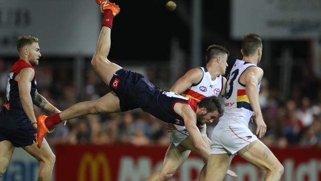 Melbourne’s Joel Smith with the acrobatics. Picture: Getty Images