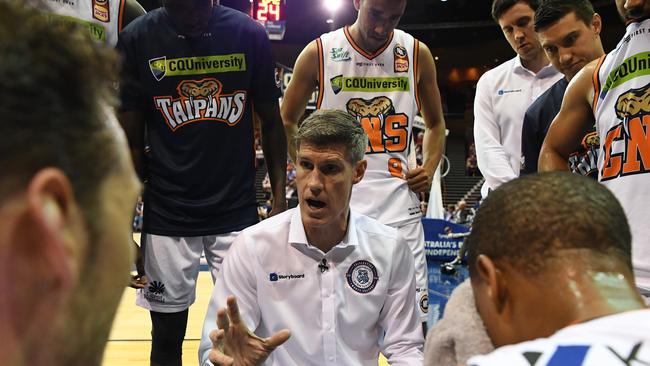 Taipans coach Mike Kelly talks to his players during the Round 1 NBL match between the Brisbane Bullets and Cairns Taipans at the Brisbane Convention and Exhibition Centre in Brisbane, Saturday, October 13, 2018. (AAP Image/Dan Peled) NO ARCHIVING, EDITORIAL USE ONLY