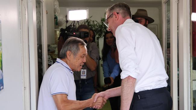 Mr Perrottet pictured meeting local dry cleaning owner Tom Nguyen in Penshurst. Picture: NCA NewsWire/ Damian Shaw