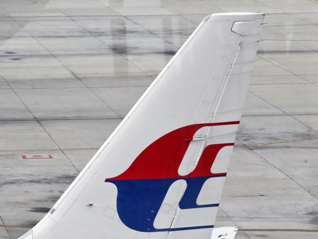 Malaysia Airline aircraft taxi at the Kuala Lumpur International Airport.