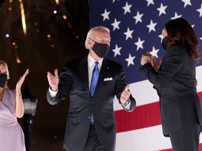 Presidential candidate Joe Biden, centre, with vice presidential nominee Kamala Harris, far right, and Jill Biden (far left). Picture: AFP