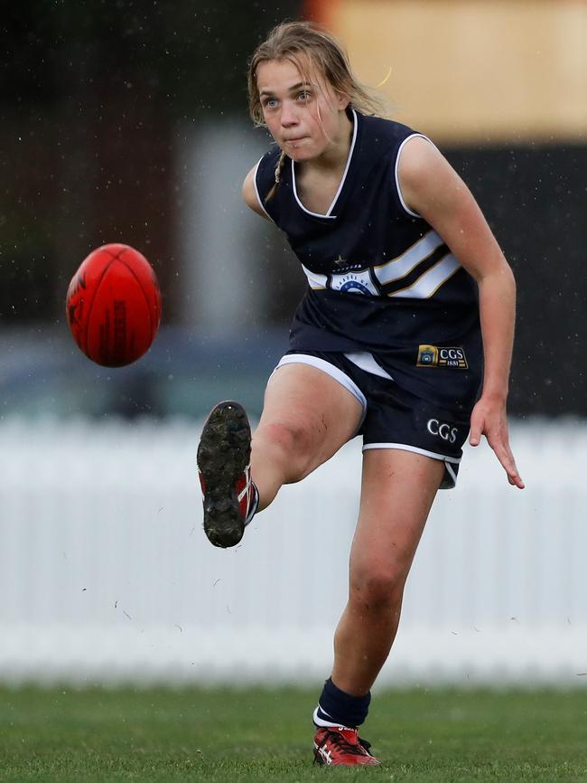 Aimee Herington of Caulfield Grammar kicks the ball. Picture: Dylan Burns/AFL Photos via Getty Images