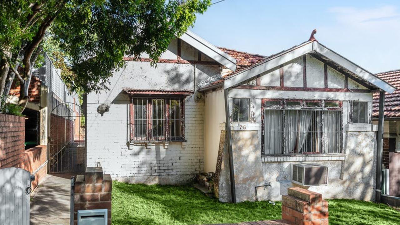 The falling down house sold for $2.6m, $800,000 above reserve, at today’s auction.