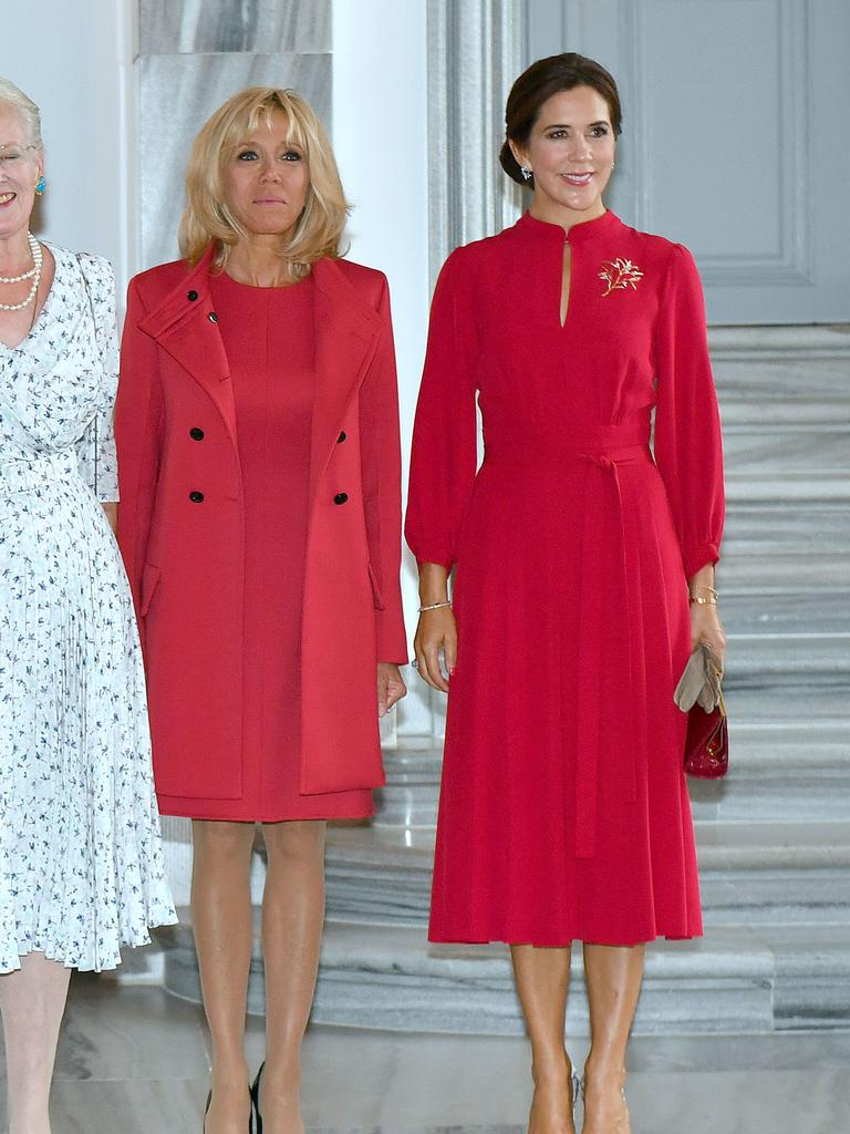 Crown Princess Mary poses with French President Emmanuel Macron's wife Brigitte Macron.