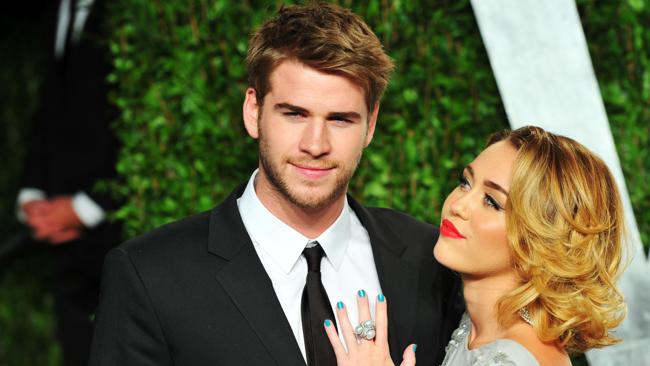 Liam and Miley at the Vanity Fair Oscars after party in 2012. Picture: Getty 