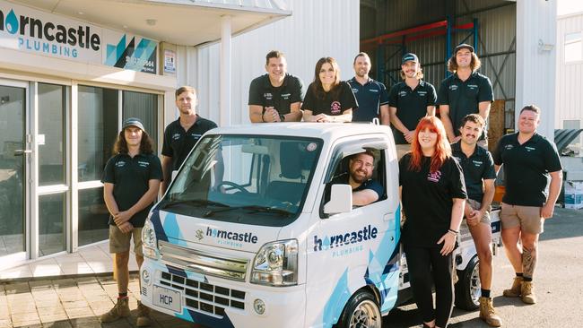 Cal Horncastle (in the van) and the team from Horncastle Plumbing who have been voted the best plumbers in the state for the second year in a row. Picture: Supplied.