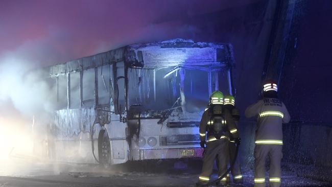 The fire-damaged bus on the M4 this morning. Picture: Gordon McComiskie