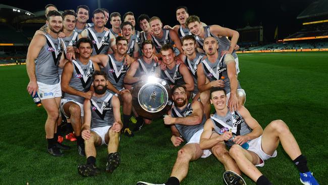 Port Adelaide celebrates with the Showdown Shield and pose for a team photo. Picture: Mark Brake/Getty Images