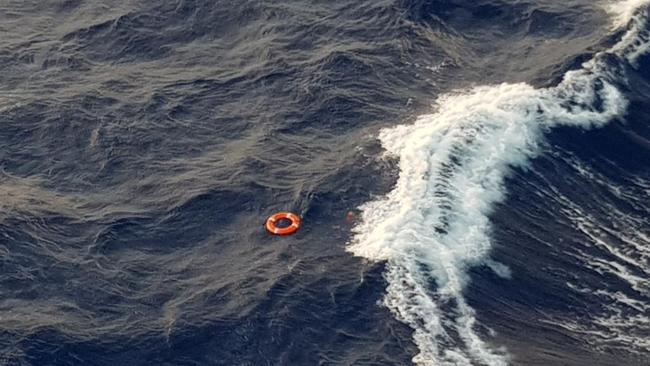 One passenger posted an image on Twitter of a life ring floating in the water and said the situation was 'horrendous'. Twitter/Jonathan Trevithick