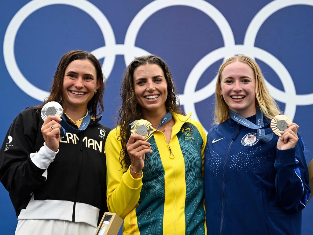Silver medallist Germany's Elena Lilik, left, gold medallist Australia's Jessica Fox, and bronze medallist USA’s Evy Leibfarth, right, on the podium. Picture: Olivier Morin/AFP