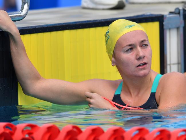 Ariarne Titmus (left) of Australia is seen after her heat of the Women's 200m Freestyle on day one of the swimming competition at the XXI Commonwealth Games at Gold Coast Aquatic Centre on the Gold Coast, Australia, Thursday, April 5, 2018. (AAP Image/Darren England) NO ARCHIVING, EDITORIAL USE ONLY