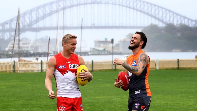 GWS Giants star Zac Williams, right, with Sydney’s Isaac Heeney. Picture: Toby Zerna