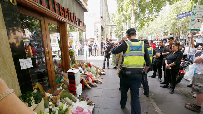 MELBOURNE, AUSTRALIA - NOVEMBER 10:  Mourners lay floral tributes at the iconic Melbourne cafe Pellegrinis on November 10, 2018 in Melbourne, Australia. Co-owner of the cafe Sisto Malaspina died from injuries suffered in an incident on Bourke Street on November 9th. A man was shot dead by police after he set his car alight in Bourke St mall and went on a stabbing frenzy on Friday afternoon. One person was killed and another two injured. Police are treating the event as a terrorist attack.  (Photo by Darrian Traynor/Getty Images)