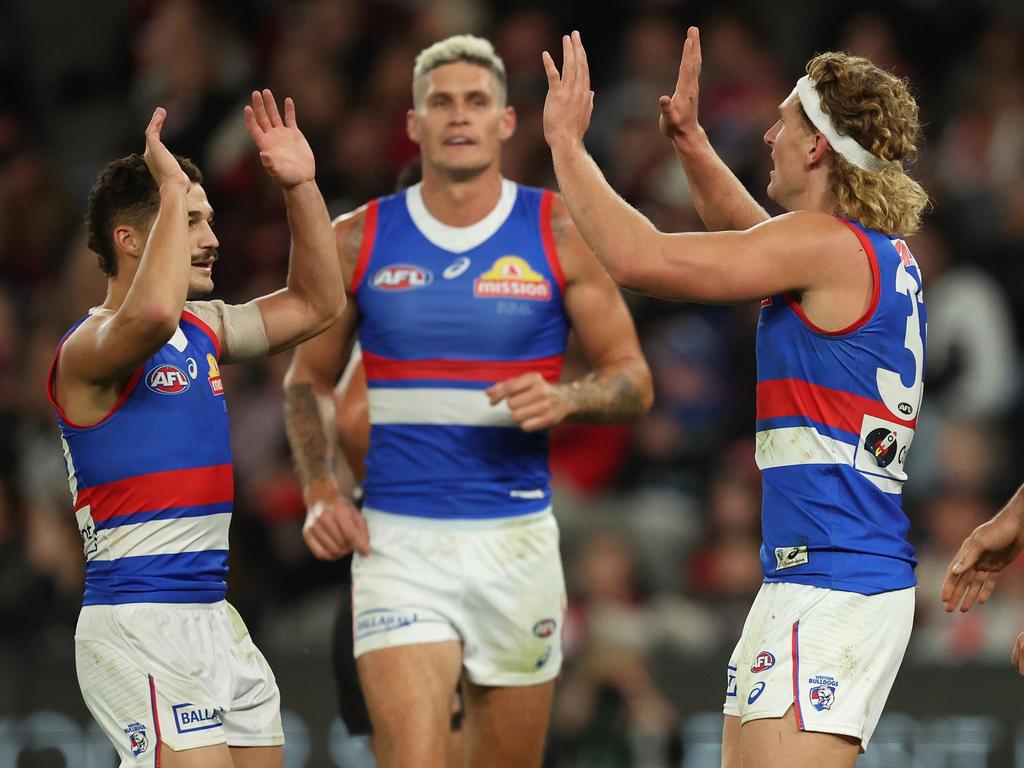 MELBOURNE, AUSTRALIA - APRIL 18: Aaron Naughton of the Bulldogs celebrates after scoring a goal during the round six AFL match between St Kilda Saints and Western Bulldogs at Marvel Stadium, on April 18, 2024, in Melbourne, Australia. (Photo by Robert Cianflone/Getty Images)