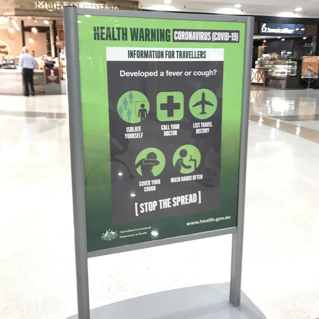 AWARENESS: Signs sharing the symptoms of the coronavirus have been placed around the Kingaroy Shoppingworld. (Photo: Jessica McGrath)