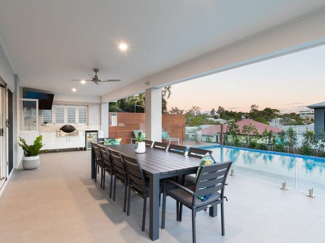 The rear view and outdoor swimming at the Dorrigo St, Stafford Heights home which sold for $1.6 million. Picture: Supplied