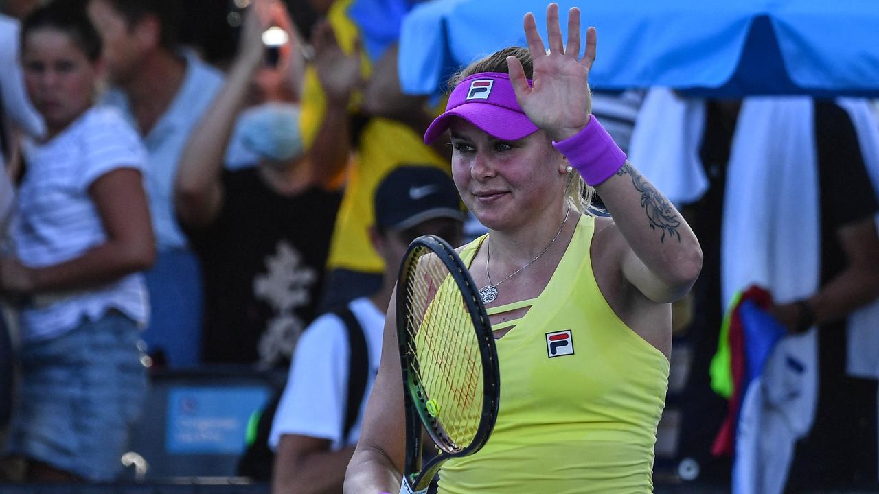 Ukraine's Kateryna Baindl celebrates after her victory against Russia's Kamilla Rakhimova. (Photo by Paul CROCK / AFP)