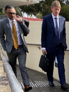 Reinhold Hans Schmidt and his lawyer leaving Toronto Local Court on Tuesday. Picture Amy Ziniak