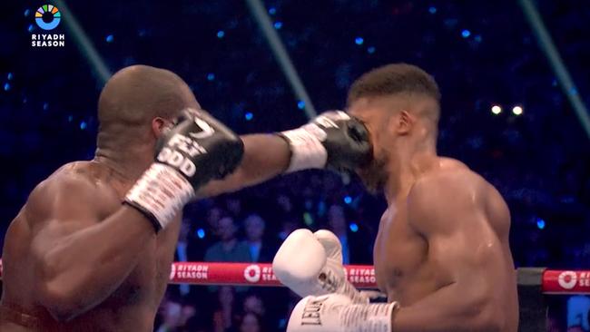 Daniel Dubois was all over Anthony Joshua. Photo: DAZN.