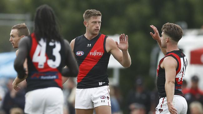 Jayden Laverde celebrates a goal during Essendon’s Marsh Series win.