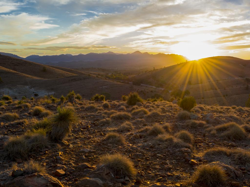 <h2>11. Flinders Ranges</h2><p>Get a taste of true outback life and head on a road trip 5.5 hours north of Adelaide, to the <a href="https://southaustralia.com/places-to-go/flinders-ranges-and-outback" target="_blank" rel="noopener">Flinders Ranges</a>. At the heart of the Flinders, nestled in the middle of a ring of mountains, is historic Wilpena Pound. Rawnsley Park Station has accommodation options, from eco luxury villas, to camp grounds. For amazing views of the rugged mountain landscape, head to Yacca Lookout.</p>