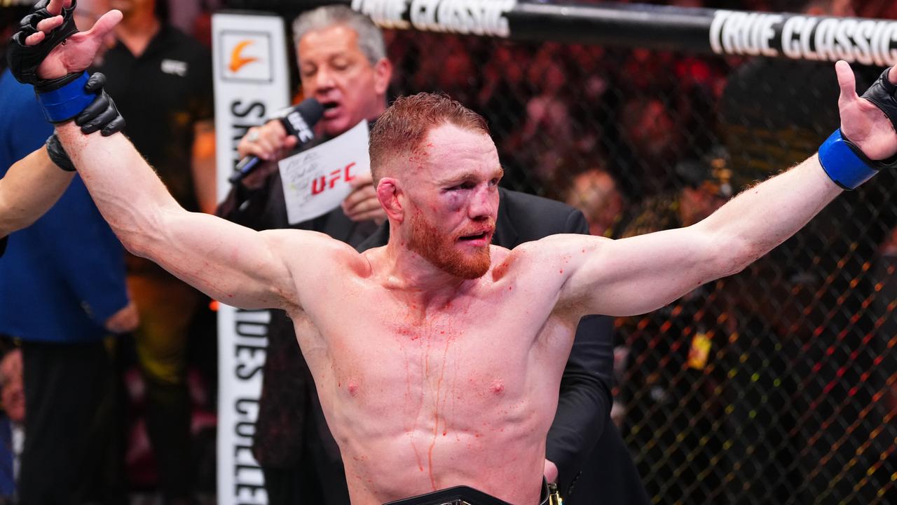 ‘F***ing good’: Aussie claims UFC title in Fight of the Year contender