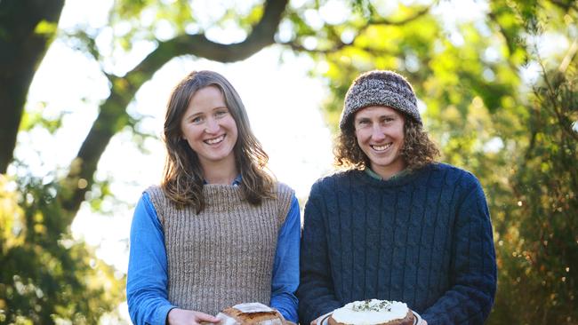 Courtney Young and Ian Congdon mill grains at Berrigan. Picture: Zoe Phillips