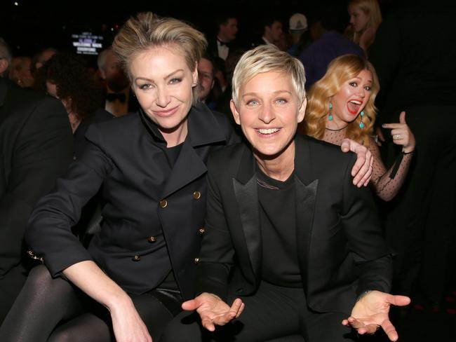 Someone’s as excited as the rest of us would be if they met Portia de Rossi and Ellen DeGeneres. The trio attended the 55th Annual 2013 Grammy Awards. Picture: Getty