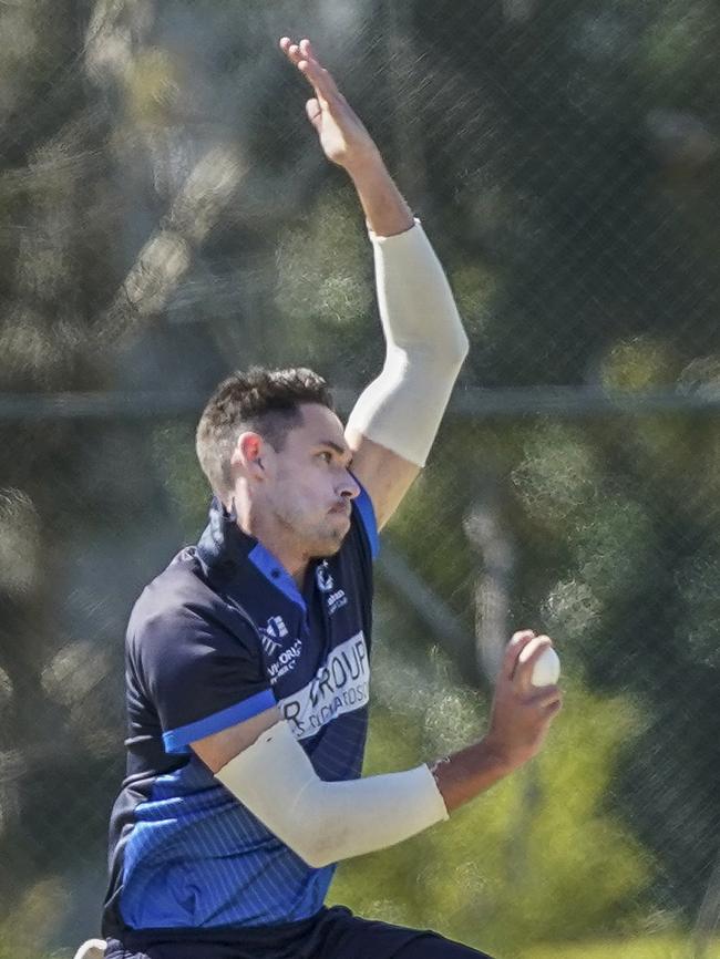 Nick Boland bowling for Prahran. Picture: Valeriu Campan