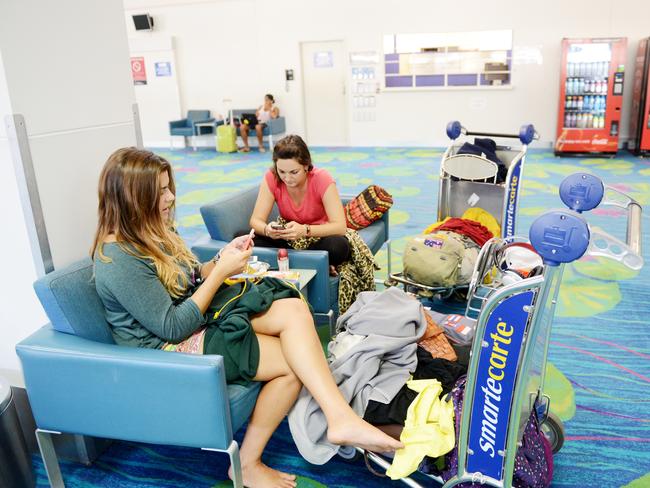 Delays could be coming to an end ... passengers inside Darwin Airport on Saturday. Picture: Elise Derwin