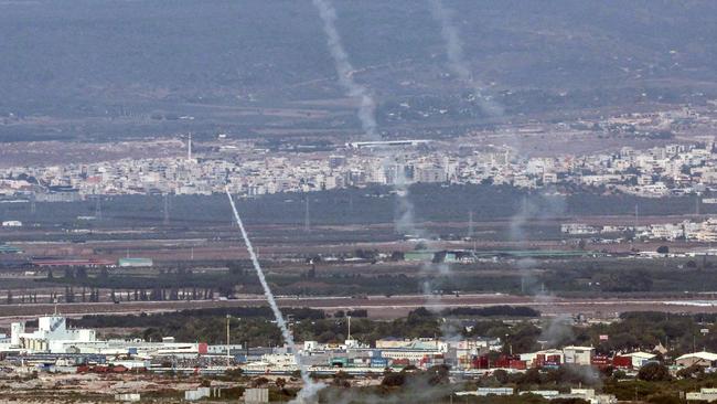 Rockets from Israel's Iron Dome air defence system intercept rockets over Haifa. Picture: AFP.