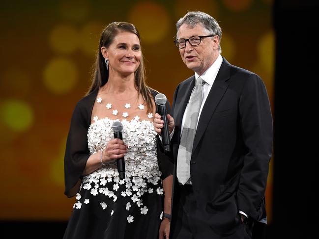 NEW YORK, NY - MAY 14: Melinda Gates and Bill Gates speak on stage during The Robin Hood Foundation's 2018 benefit at Jacob Javitz Center on May 14, 2018 in New York City. (Photo by Kevin Mazur/Getty Images for Robin Hood)